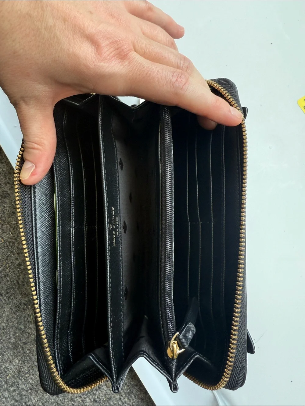 kate spade Black Wallet with Pink Ear Accents and Gold Cat Whisker Detail